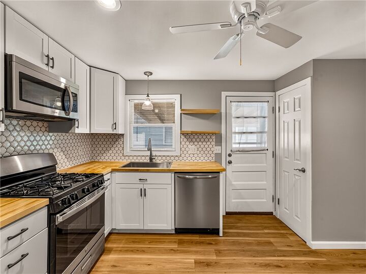 Property Photo:  32 Canasta Road  NY 14615 