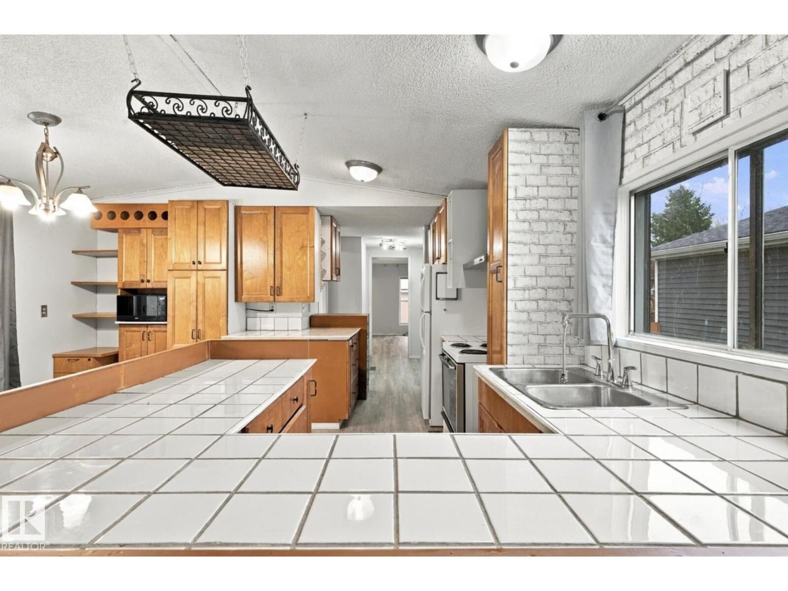 Property Photo: 2664 Lakeview Dr NW AB T5S 1T7