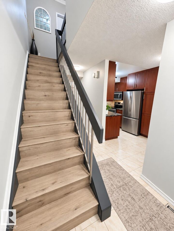 Property Photo:  12034 25 Ave NW  AB T6J 4L3 