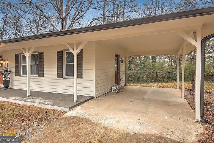 Property Photo:  5283 Maple Valley Rd SW  GA 30126 