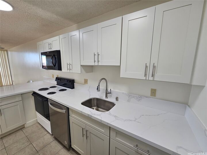 Property Photo:  98-402 Koauka Loop 1916  HI 96701 