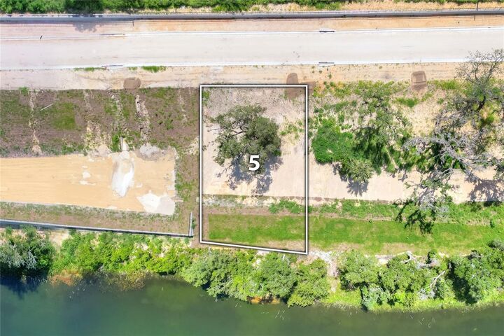 Property Photo:  177 Tranquil Mirror Lake Court Lot 5  FL 34711 
