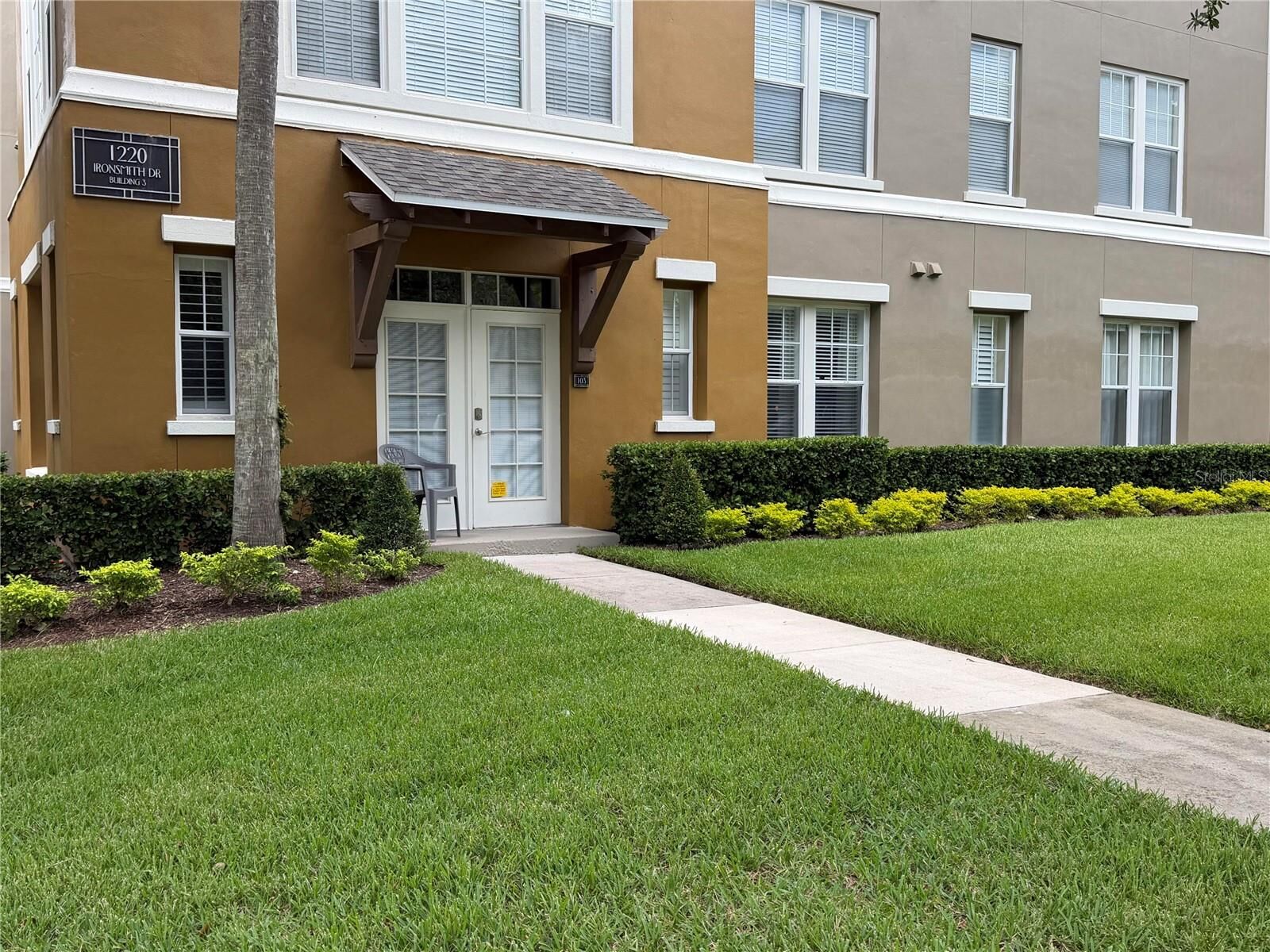 Property Photo:  1401 Celebration Avenue 103  FL 34747 