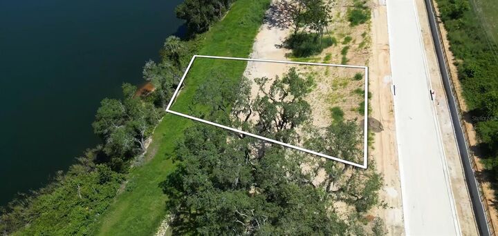 Property Photo:  161 Tranquil Mirror Lake Court Lot 9  FL 34711 