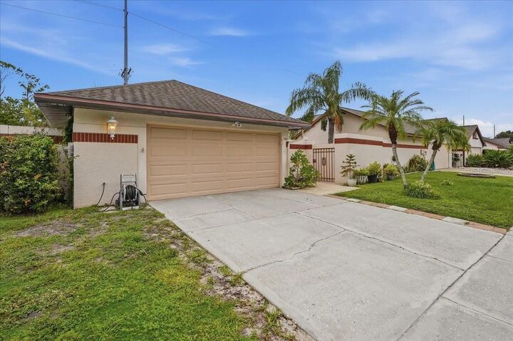 Property Photo:  7047 Silvermill Drive  FL 33635 