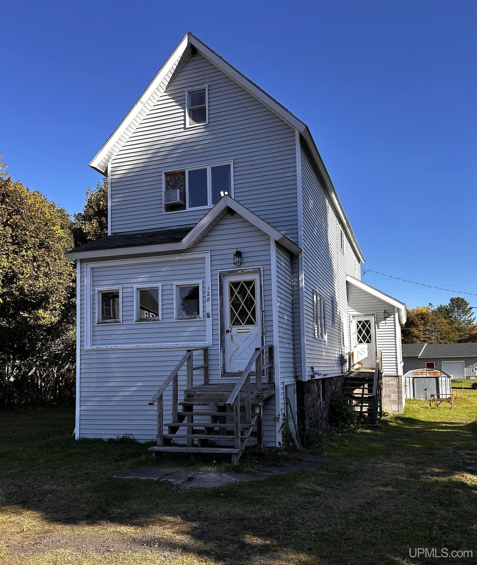 Property Photo:  128 N Iroquois Street  MI 49913 