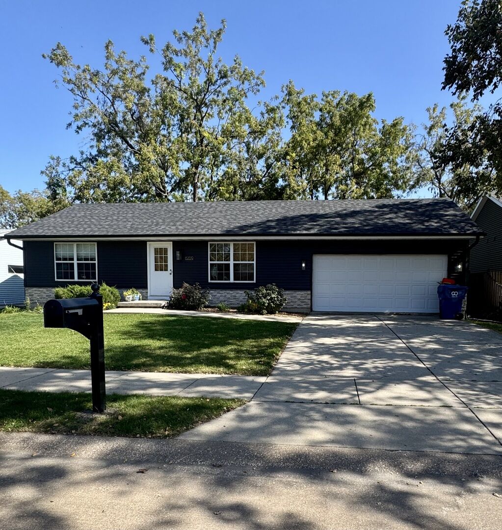 Property Photo:  6209 Kelling Street  IA 52806 