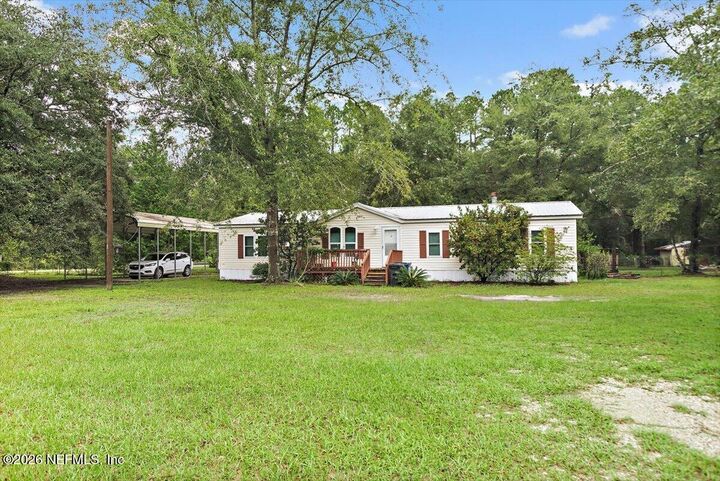 Property Photo:  1776 Tustenuggee Court  FL 32009 