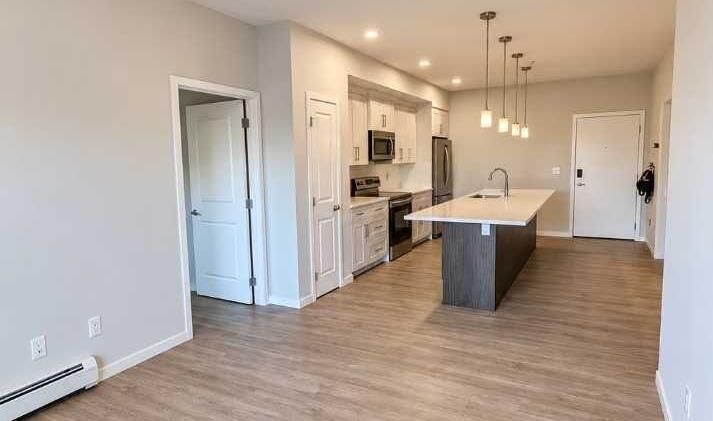 Property Photo: 4150 Seton Drive SE 113 AB T3M 2C7