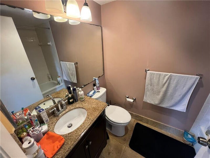 Property Photo:  2339 SW 15th Street 24  FL 33442 