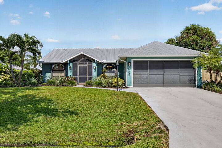 Property Photo:  609 SE Barr Street  FL 34984 