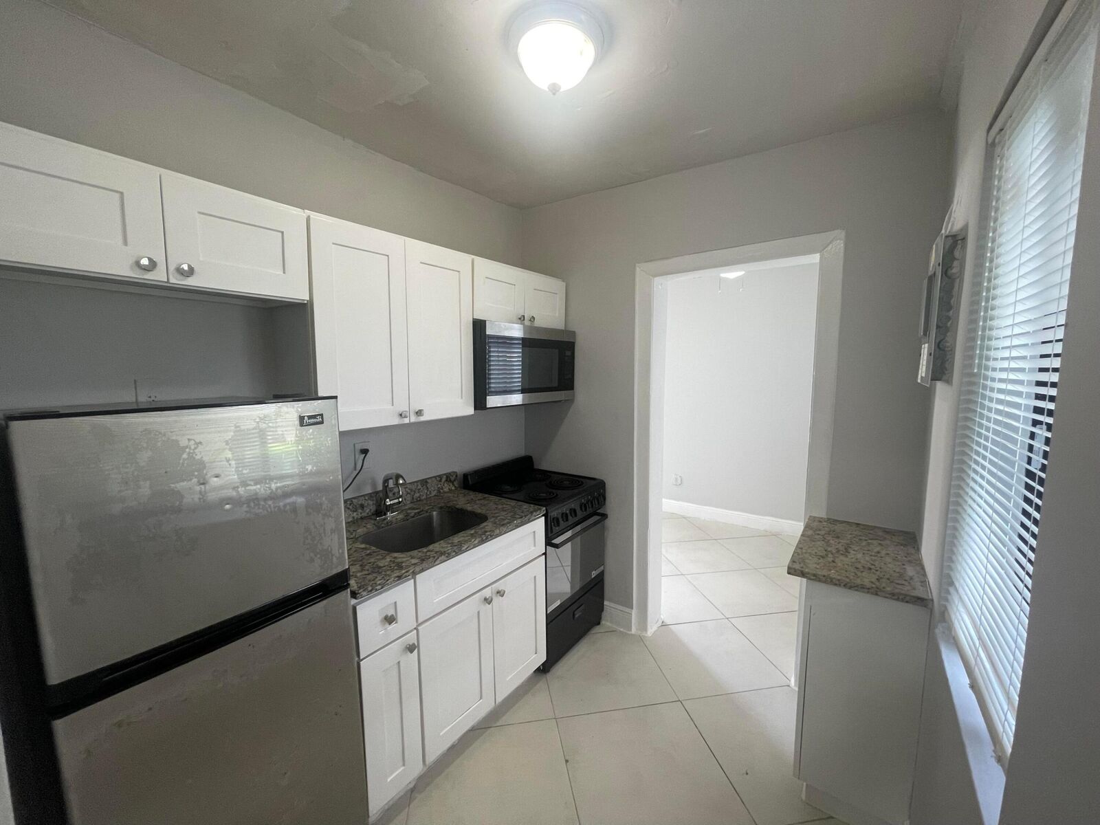 Property Photo: 103 NW 7th F FL 33060
