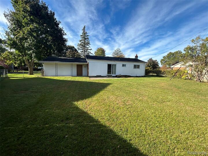 Property Photo: 812 Marion Drive MI 48442