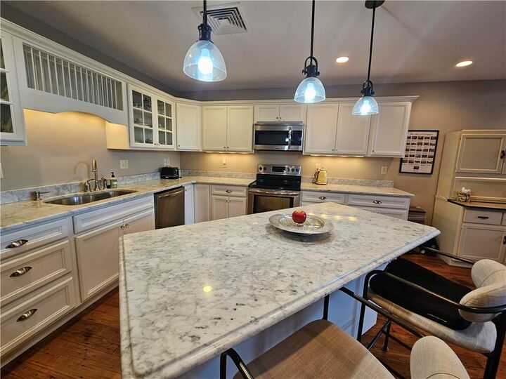 Property Photo: 1 Tupperware Drive 329 RI 02896
