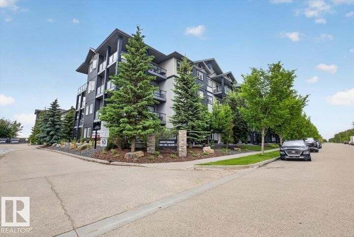 Property Photo: 1204 156 Street NW 106 AB T6R 0R6