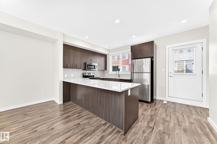 Property Photo: 903 Crystallina Nera Way NW 56 AB T5Z 0N6