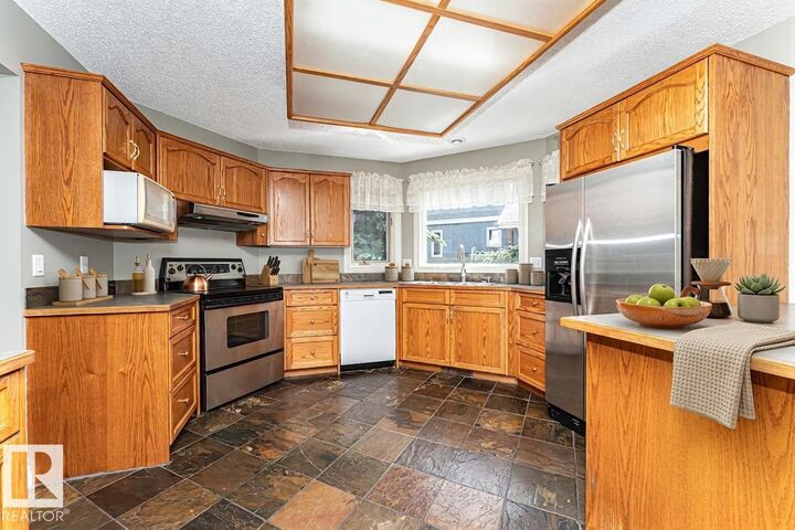 Property Photo:  221 Ockenden Place NW  AB T6R 1K5 