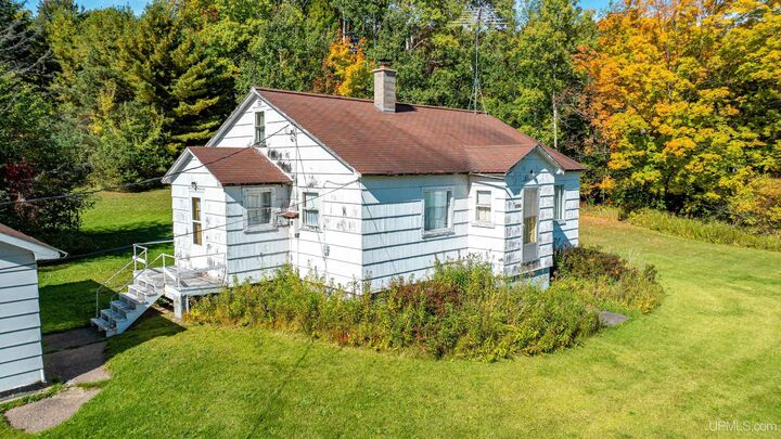 Property Photo:  42767 Wilson Memorial Drive  MI 49916 