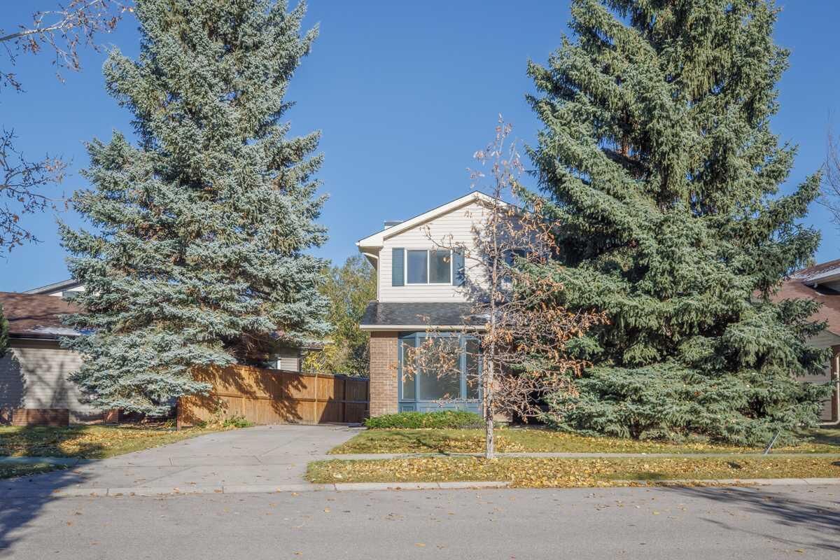 Property Photo:  383 Woodfield Road SW  AB T2W 3V8 