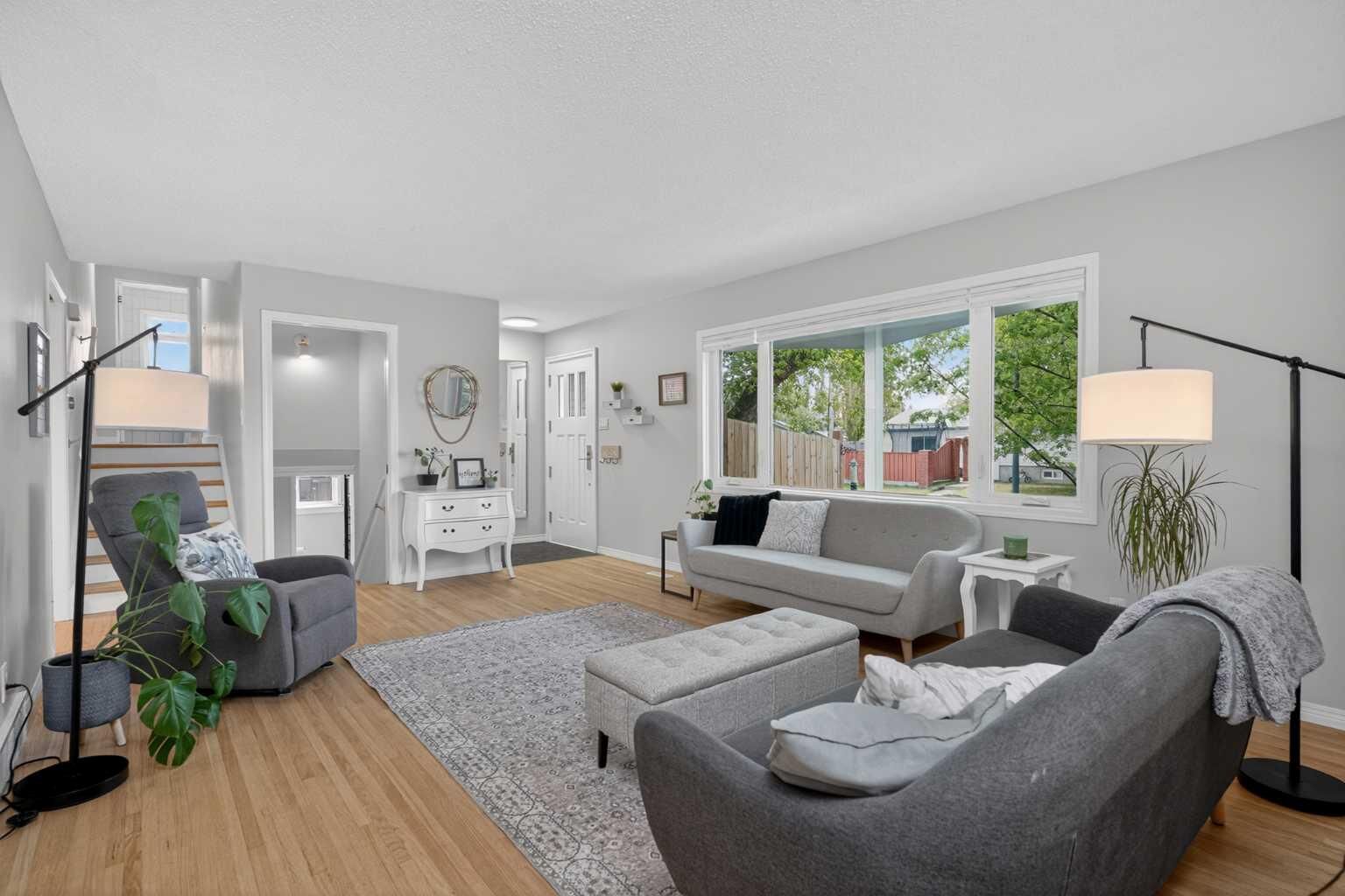 Property Photo:  10704 Maplecrest Road SE  AB T2J 1X9 