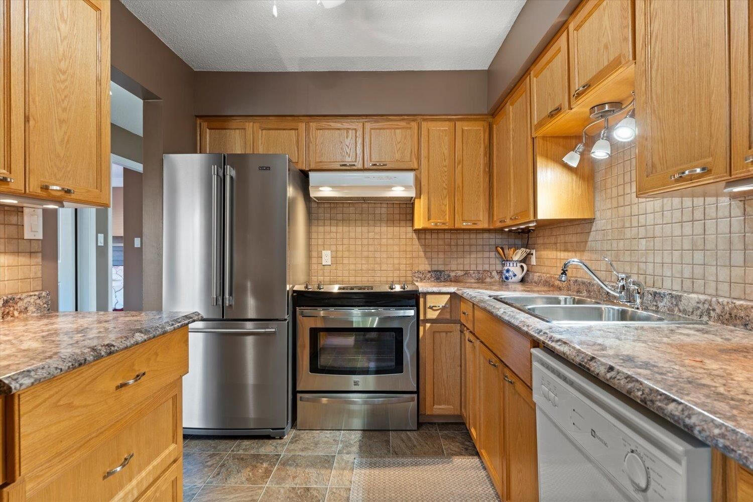 Property Photo:  32885 George Ferguson Way 106  BC V2S 7X1 