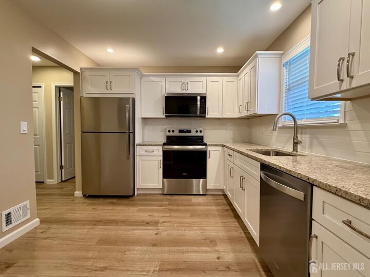 Property Photo: 8 Benjamin Franklin Drive F NJ 08831
