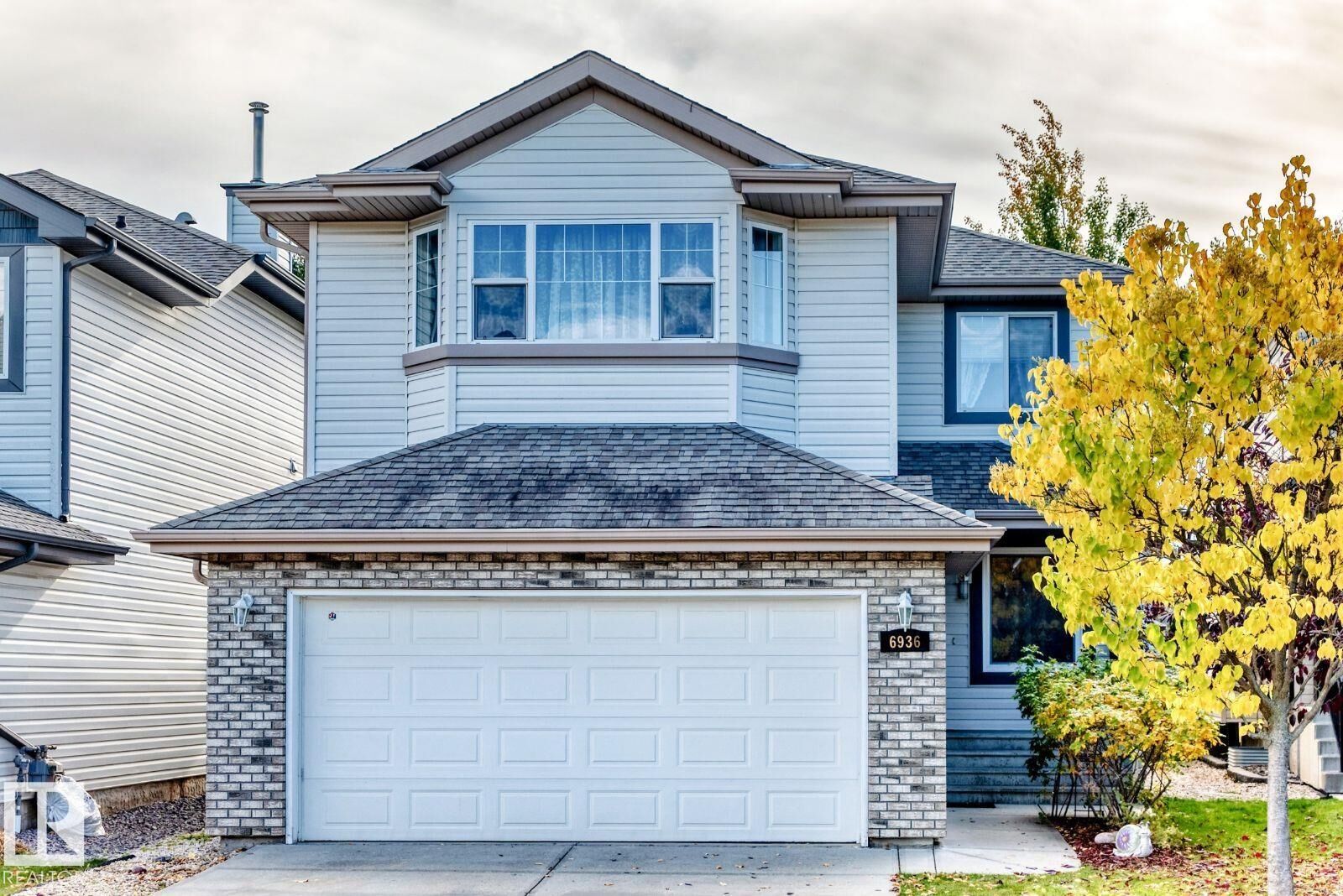 Property Photo:  6936 Strom Lane NW  AB T6R 0J9 