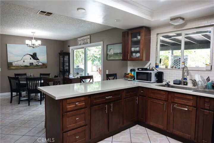 Property Photo:  10837 Locust  CA 92316 