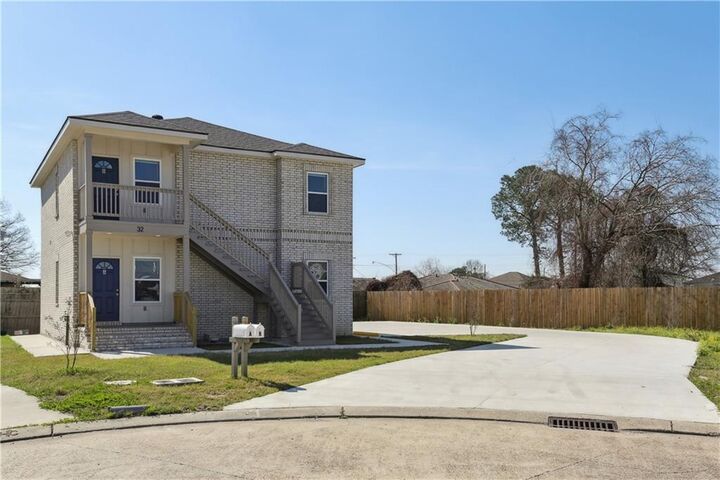Property Photo:  32 Ashton Cox Drive A  LA 70053 