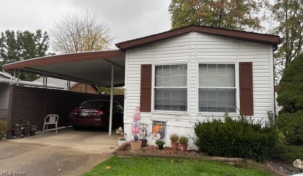 Property Photo:  450 Whispering Pines Drive NW  OH 44481 