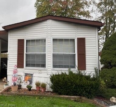 Property Photo: 450 Whispering Pines Drive NW OH 44481