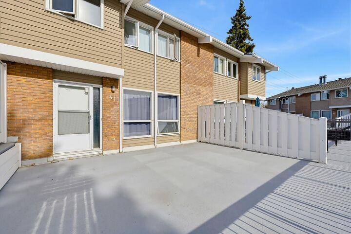 Property Photo:  116 Silver Crest Drive NW 41  AB T3B 4N9 