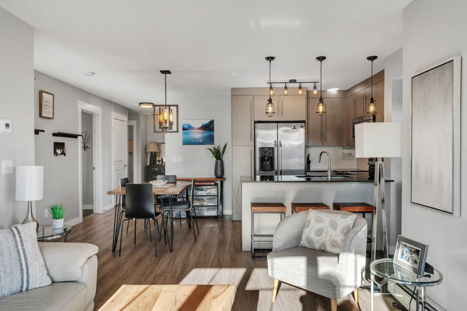 Property Photo:  11 Mahogany Row SE 1410  AB T3M 2L6 
