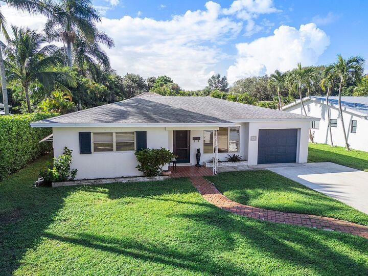 Property Photo: 102 NW 12th Street FL 33444