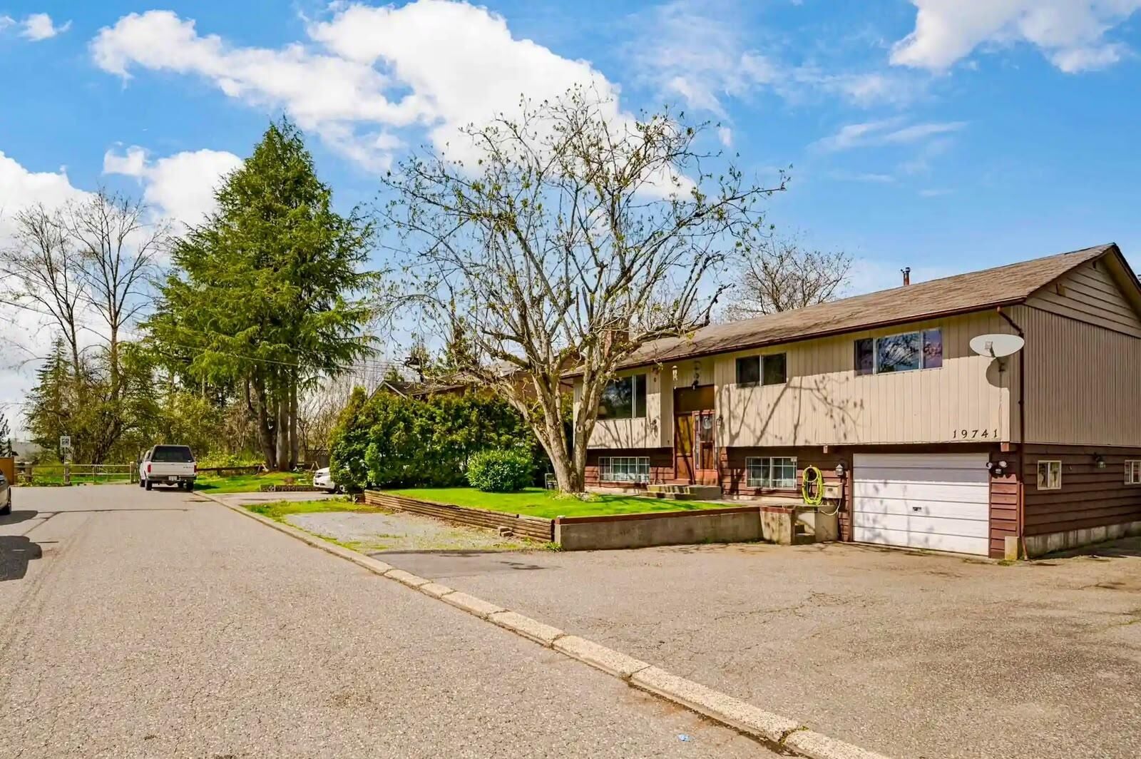 Property Photo:  19741 54A Avenue Main  BC V3A 3W4 