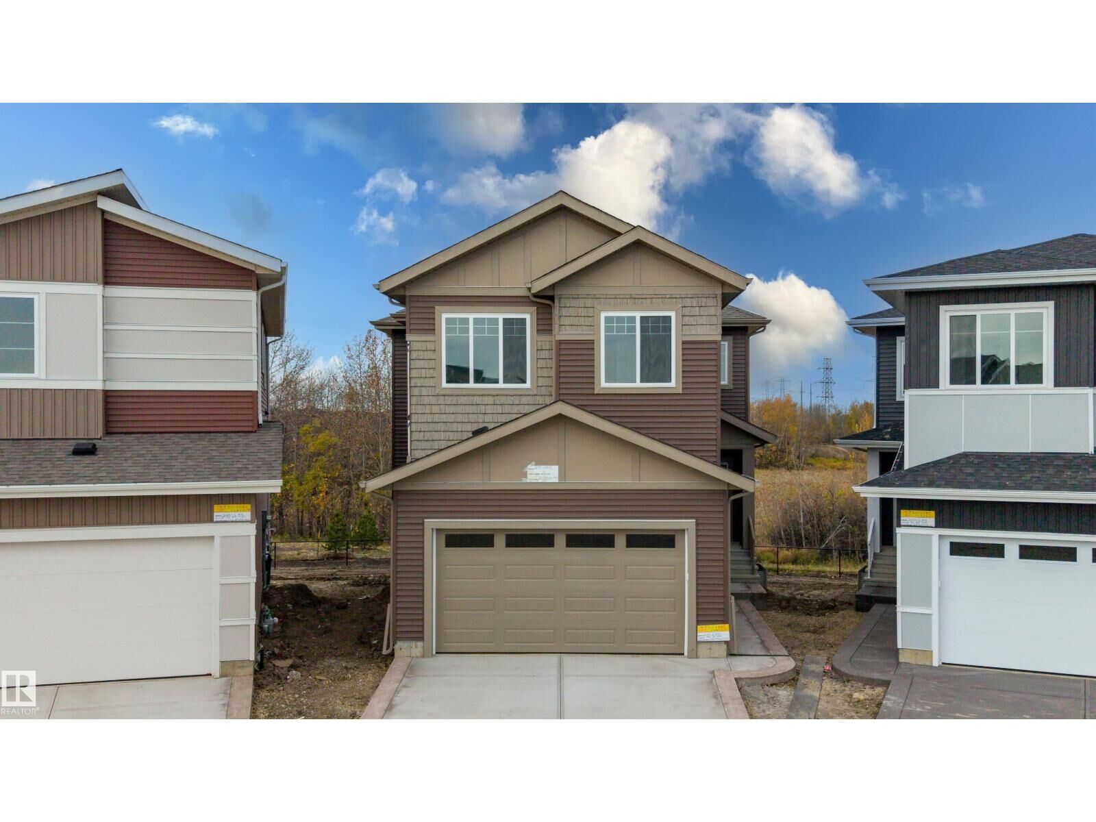 Property Photo:  2159 1 Av SW  AB T6X 3P6 