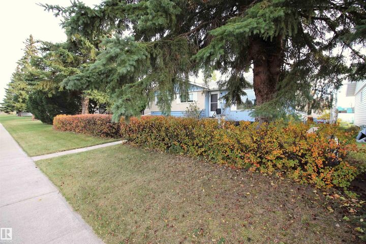 Property Photo:  10711 102 Street  AB T7P 1H6 