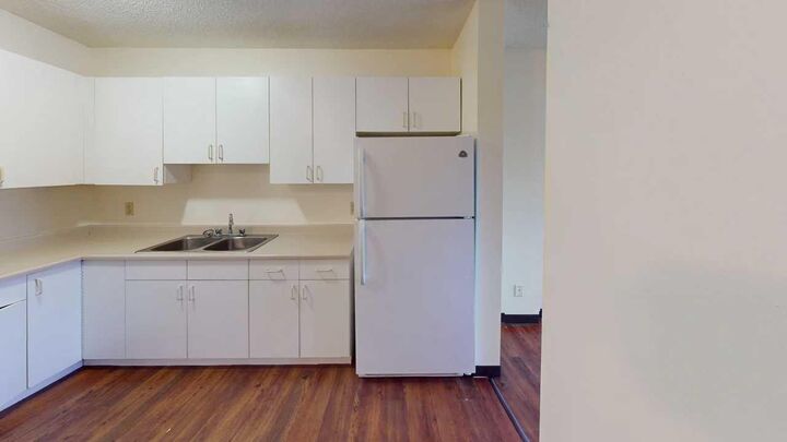 Property Photo:  5117 44 Street 302  AB T0G 1E0 