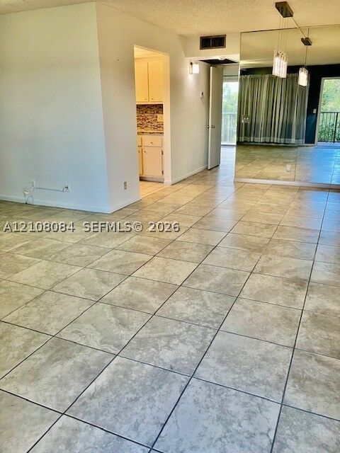 Property Photo: 850 SW 133rd Ter 411B FL 33027