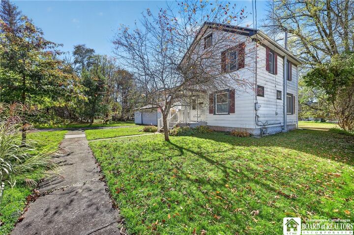 Property Photo:  1 S Plymouth Avenue  NY 14737 