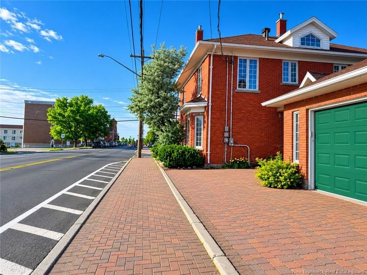 Property Photo:  102 St. George  NB E2A 1B5 