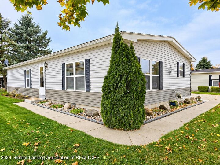 Property Photo:  310 Banberry  MI 48906 