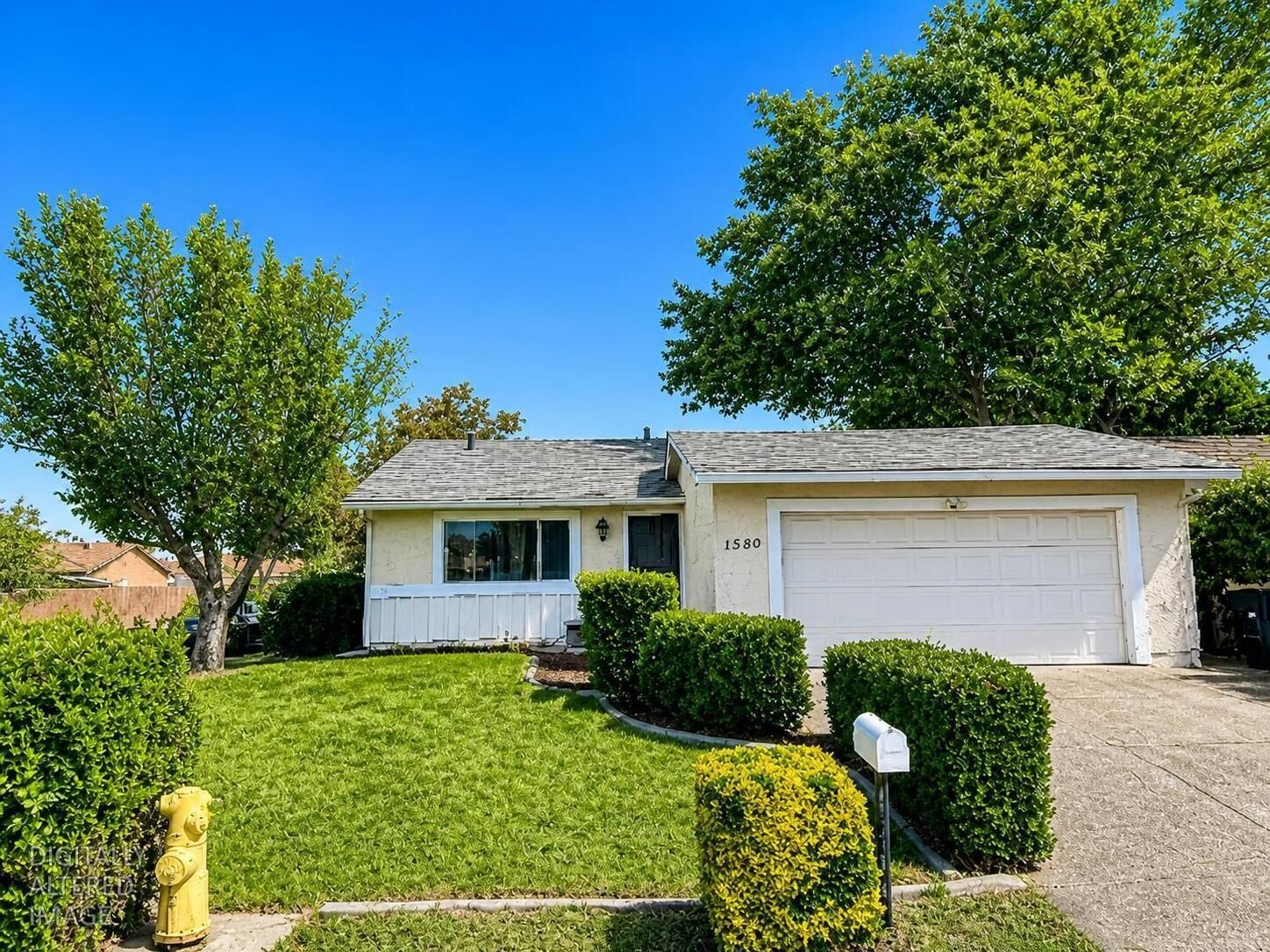 Property Photo:  1580 Griffith Place  CA 95376 