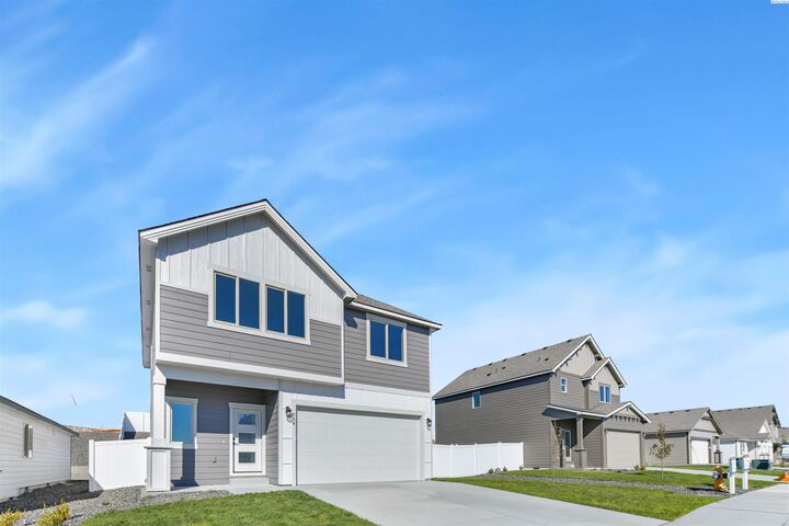 Property Photo:  734 Honeylicious St.  WA 99352 