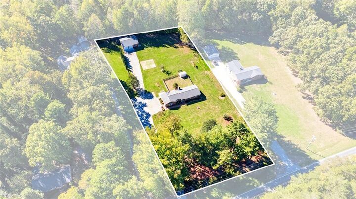 Property Photo:  3612 Southeast School Road  NC 27406 
