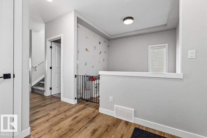 Property Photo:  7402 Chivers Crescent SW  AB T6W 4M2 