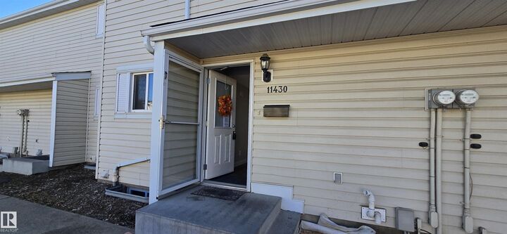 Property Photo:  11430 139 Avenue NW  AB T5X 3L4 