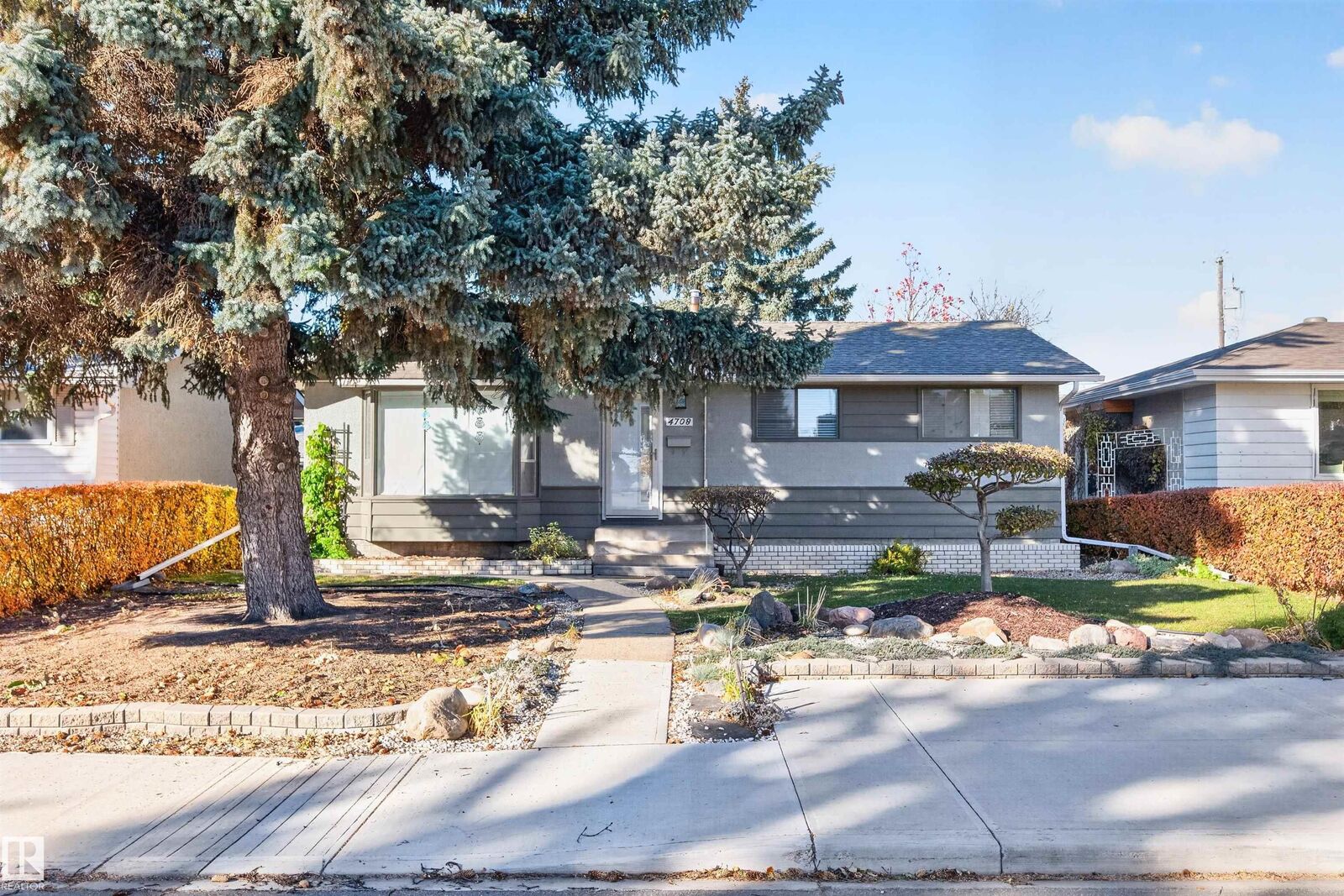 Property Photo:  4708 Malmo Road NW  AB T6H 4L6 