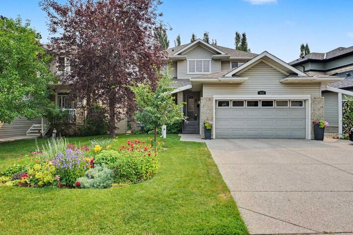 Property Photo:  915 Coopers Drive SW  AB T4B 2W3 