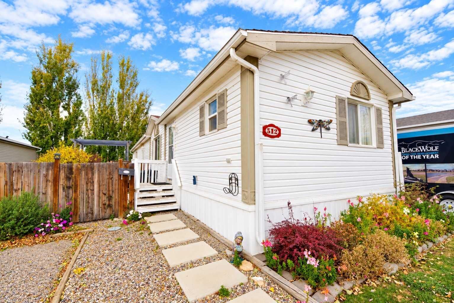 Property Photo:  512 Porter Street  AB T1M 0B1 